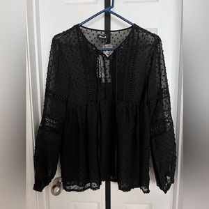 Black peplum mesh top with long sleeves